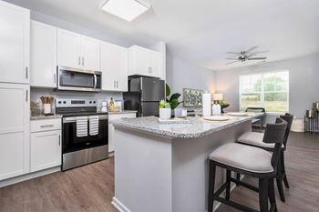 Eat-in kitchen with breakfast bar